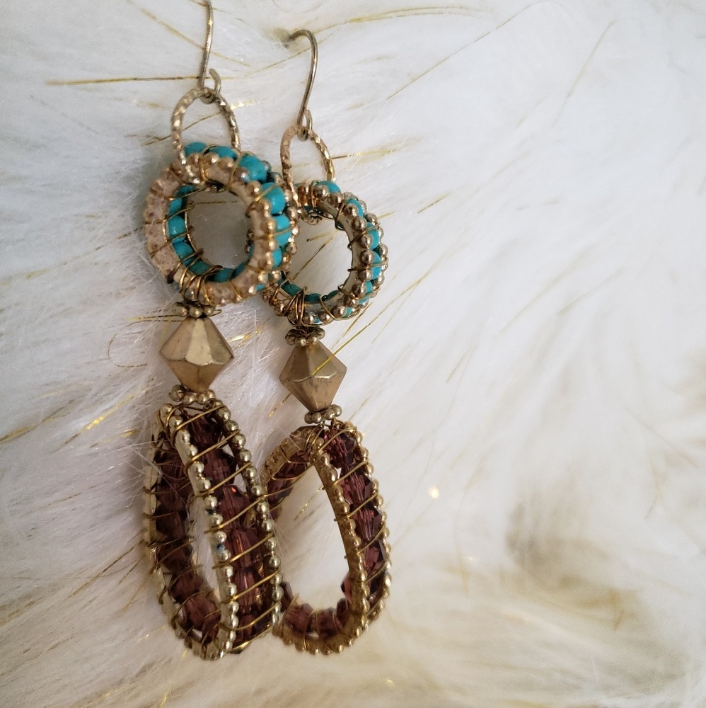 Brown and turquoise colored dangling earrings